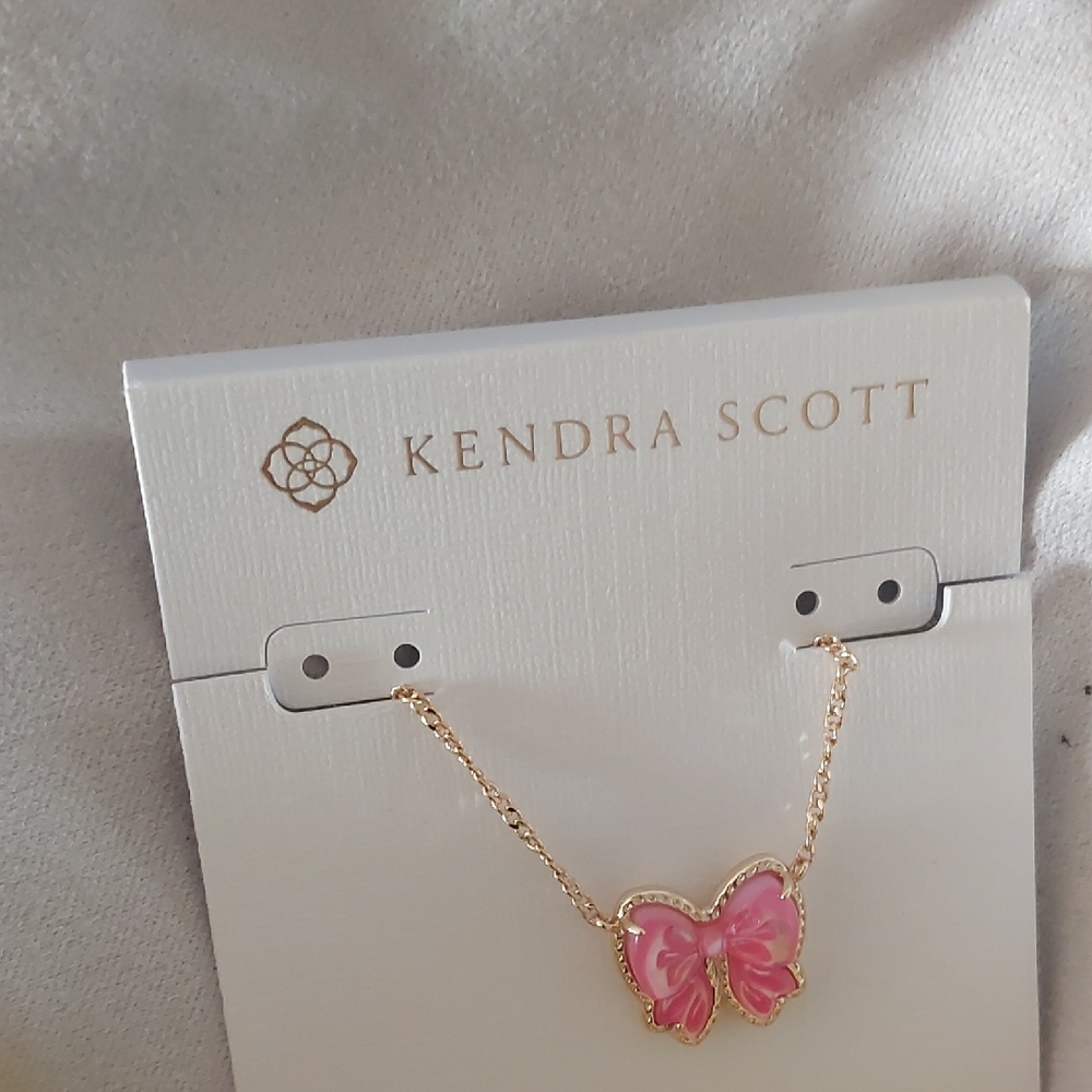 Kendra Scott Gold and Pink Bow Pendant